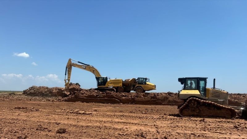 Precision Construction equipment working on Pelican Island